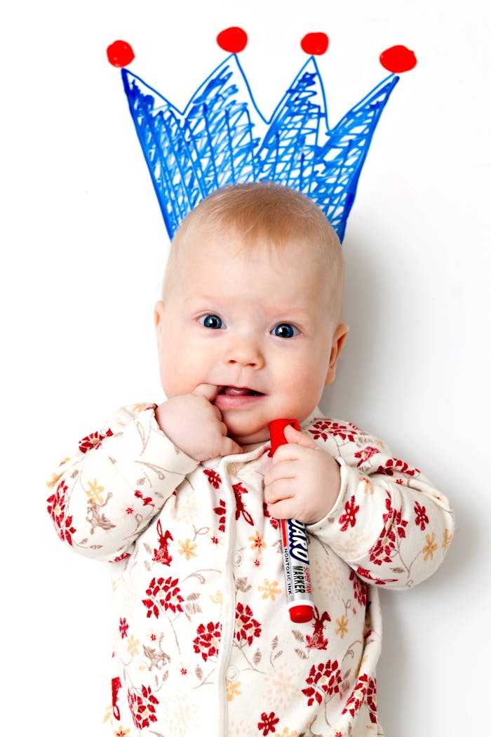 Baby in White and Red Floral Pajama